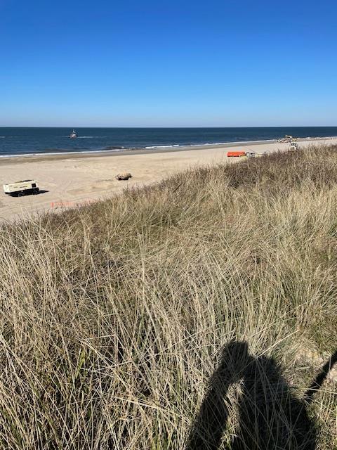 Foto van Ghislaine's schaduw op het strand